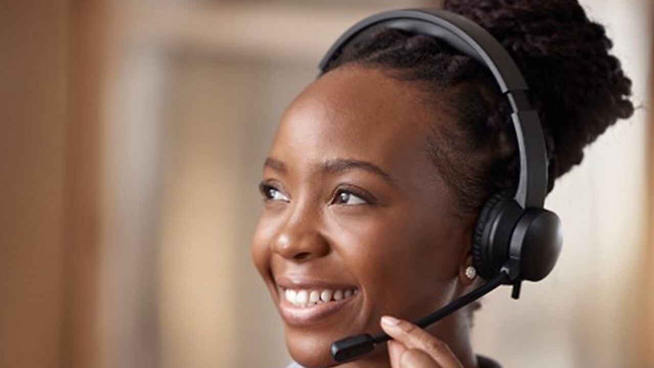 Employees using computers in an office