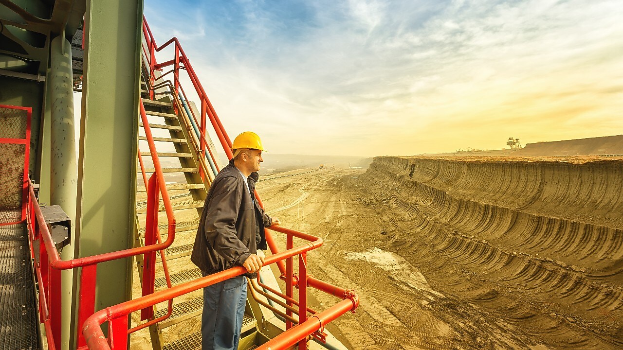 Man looking over mine