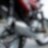 motorcycle parked on road with camera focused on the exhaust and wheels