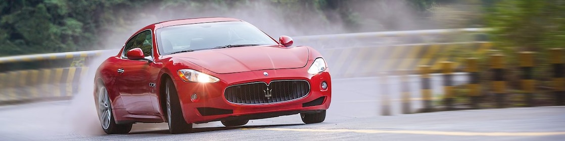 A red Maserati speeds uphill in the Shell Helix Ultra film We Know Why You Drive